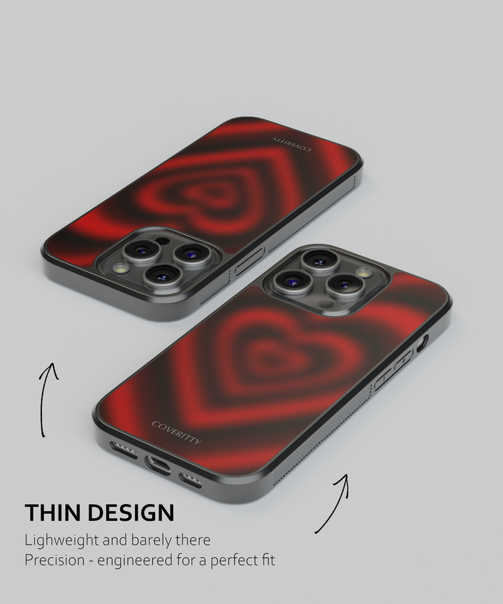 Two phone cases with red heart design on a gray background