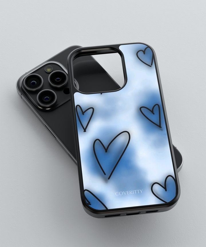Phone case with heart pattern on a light blue gradient background
