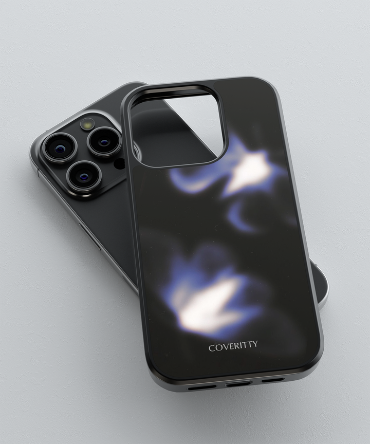 Smartphone with a black phone case featuring the brand 'COVERITTY' on a light gray background