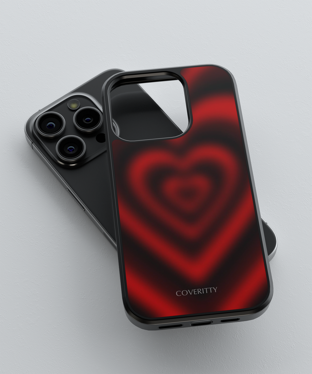 Phone case with red heart design and 'COVERITTY' branding on a gray background
