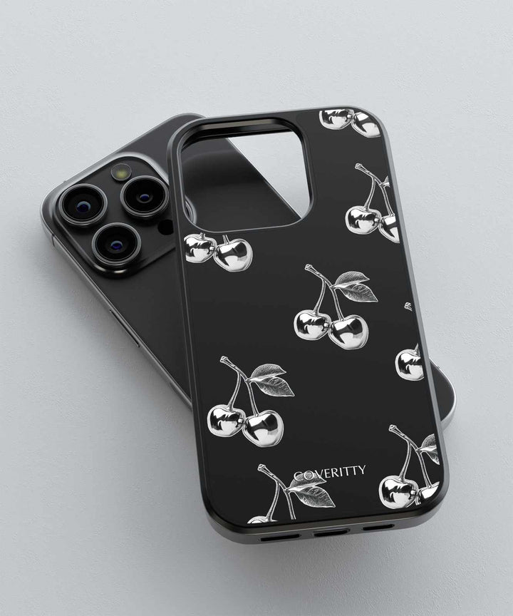 Phone case with cherry design on a gray background